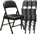 Black Padded Folding Chairs by Unknown